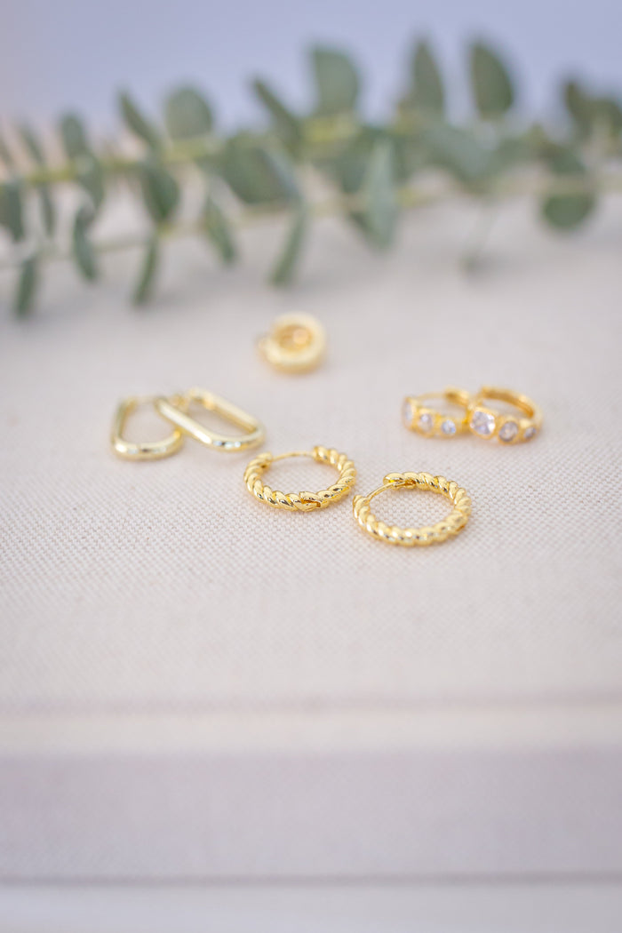 delicate mini huggies, medium gold hoops, and bold oversized styles, each piece is crafted with premium gold-filled materials for durability and shine.
