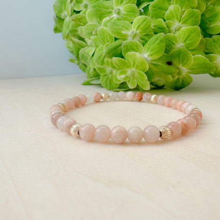 Shop the Sunstone Bracelet Stack—genuine gemstone bracelets designed for stacking or solo wear. Sunstone jewelry symbolizes warmth, light, and everyday luxury.