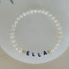 Personalized freshwater pearl bracelet with custom name, initials, or numbers. Timeless pearls + personal touch make it a meaningful gift.