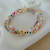 Add vibrant summer vibes to your stack with Rainbow Fun Seed Bead Bracelets featuring delicate freshwater pearls.