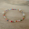 Add vibrant summer vibes to your stack with Rainbow Fun Seed Bead Bracelets featuring delicate freshwater pearls.