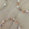 Add vibrant summer vibes to your stack with Rainbow Fun Seed Bead Bracelets featuring delicate freshwater pearls.