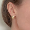 Chunky Gold Huggies – tiny, lightweight gold-filled hoops with understated shine. Staff favorite statement earrings perfect for day-to-night wear and stacking.