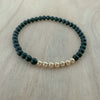 Discover the Onyx Bracelet Stack—genuine onyx gemstone and gold beaded bracelet set. A meaningful, stylish jewelry gift for everyday wear.