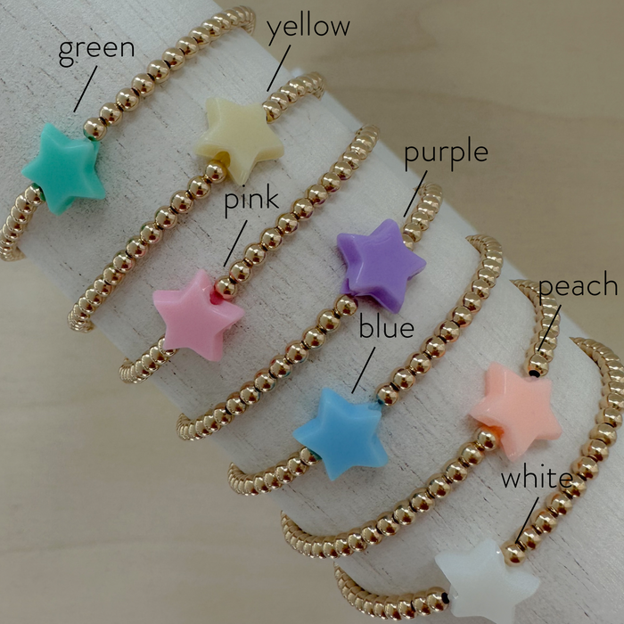 gold beaded bracelets with colorful acrylic stars