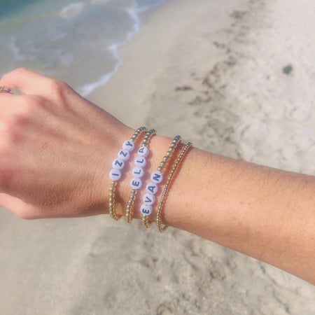 Custom personalized name bracelet with initials, names, or meaningful words. Perfect for stacking bracelets, layering, and gifting.