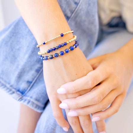 lapis beaded bracelet close up with gold beads stack of all three 