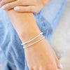 silver beaded bar bracelet on neutral background 