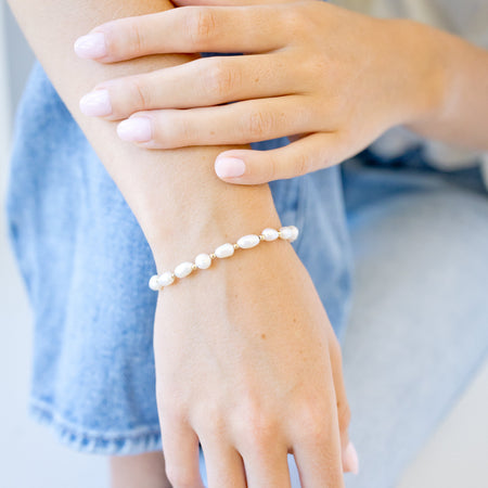 freshwater pearl bracelet every other rice shaped beads with gold beads in between 