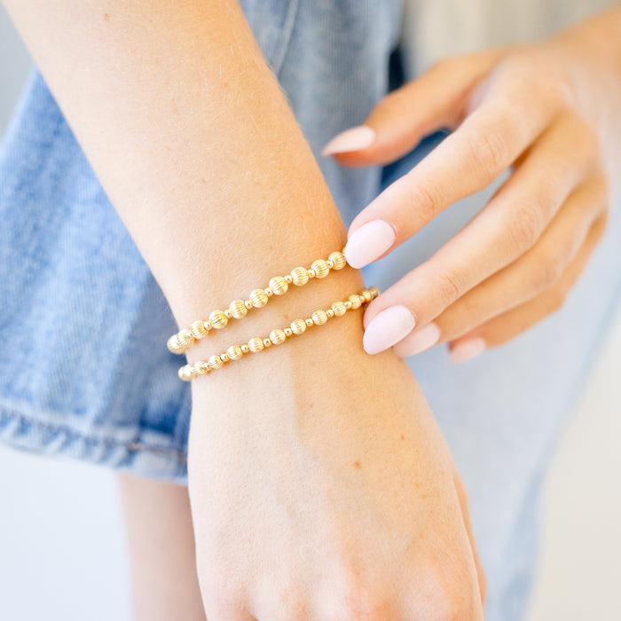 textured beaded bracelets on wrist - sterling silver 