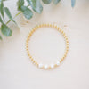 Gold beaded bracelet with single freshwater pearl four freshwater pearl 