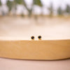 onyx bezel stud on wood bowl