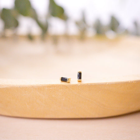 onyx baguette stud on wood bowl