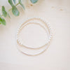 silver beaded bar bracelet on neutral background 