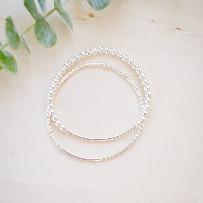 silver beaded bar bracelet on neutral background 