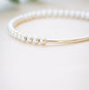 silver beaded bar bracelet on neutral background 
