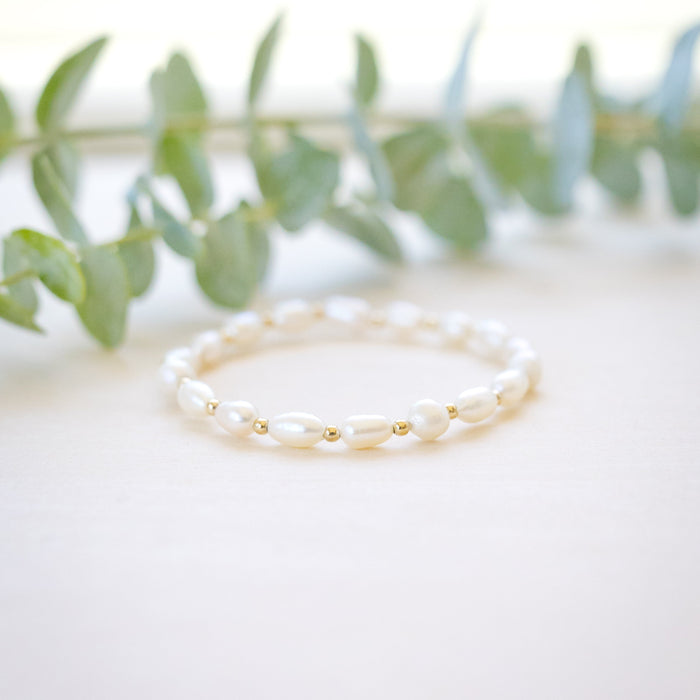 freshwater pearl bracelet every other rice shaped beads with gold beads in between 