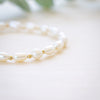 freshwater pearl bracelet every other rice shaped beads with gold beads in between 