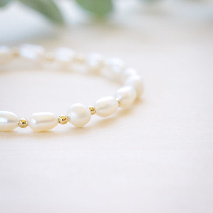 freshwater pearl bracelet every other rice shaped beads with gold beads in between 