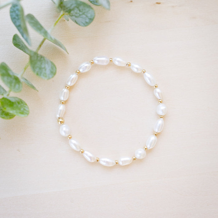 freshwater pearl bracelet every other rice shaped beads with gold beads in between 