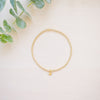tiny beaded bracelet with tiny heart charm 