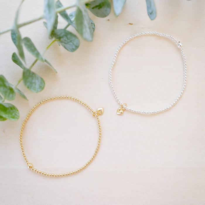 tiny beaded bracelet with tiny heart charm  or  silver 