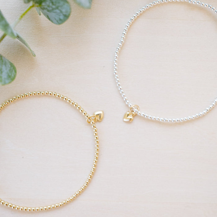 tiny beaded bracelet with tiny heart charm  or silver 