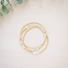 opal white cross on gold beaded bracelet 