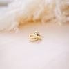 og classic timeless 13mm huggies on wood background