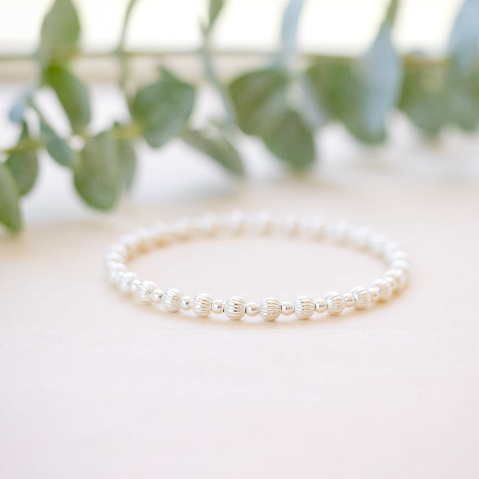 every other corrugated, fluted 6mm and 2mm beaded bracelets 