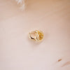 og classic timeless 13mm huggies on wood background