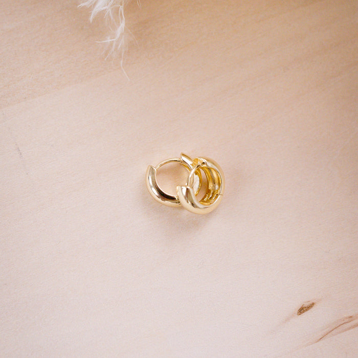 og classic timeless 13mm huggies on wood background