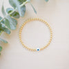 gold beaded blue and white glass evil eye bracelet - gold beaded 
