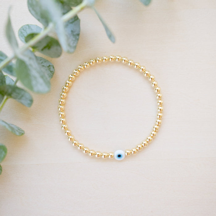 gold beaded blue and white glass evil eye bracelet - gold beaded 