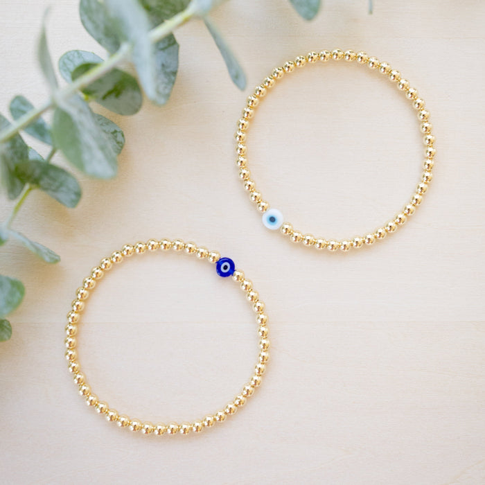 gold beaded blue and white glass evil eye bracelet - gold beaded 