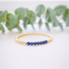 lapis beaded bracelet close up with gold beads 