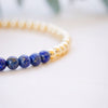 lapis beaded bracelet close up with gold beads 