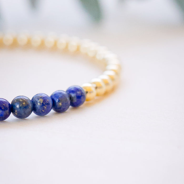 lapis beaded bracelet close up with gold beads 