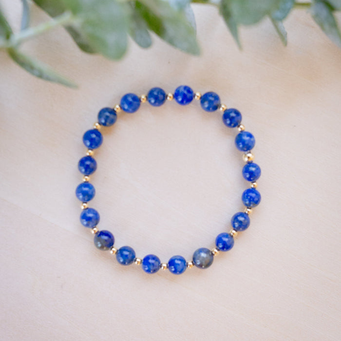 lapis beaded bracelet close up with gold beads 