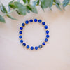 lapis beaded bracelet close up with gold beads 6mm beads 