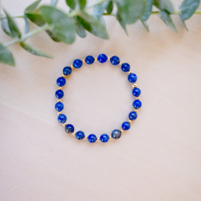lapis beaded bracelet close up with gold beads 6mm beads 