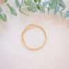 dainty gold beaded bracelet stack of four 