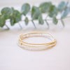 dainty gold beaded bracelet stack of four 