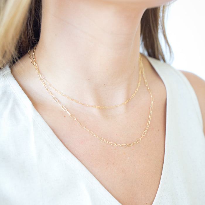 our new everyday essential ✨ A gold-filled paperclip chain that’s durable, chic, and made for daily wear—minimal or layered.