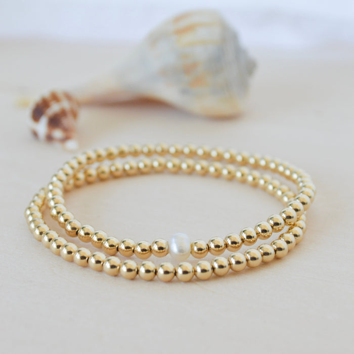 gold beaded bracelet stack - single freshwater pearl