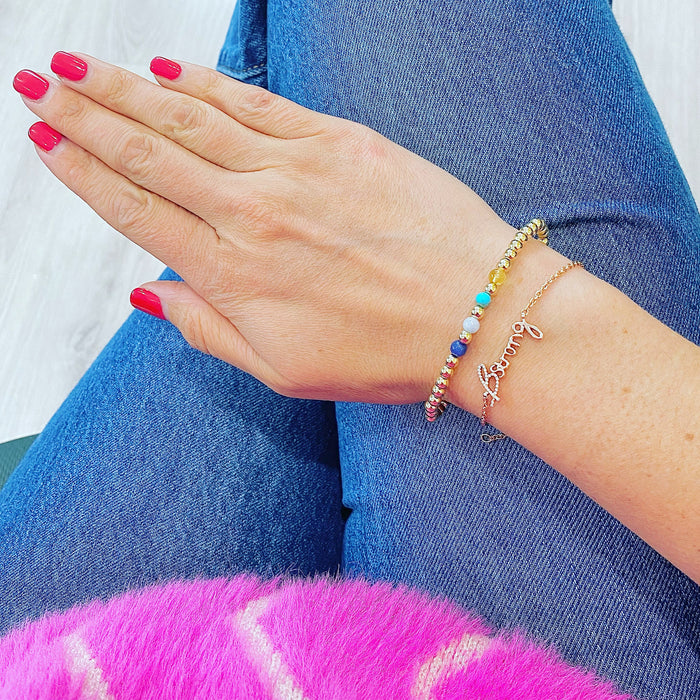 Our Family Birthstone Bracelet is a heartfelt piece of personalized jewelry—crafted with gold-filled beads and up to 20 meaningful birthstones for loved ones.