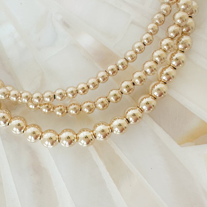 Begin your bracelet stacking journey with the Gold Starter Stack—perfect for beginners. Mix, match, and layer gold-filled bracelets for timeless, stackable everyday style.