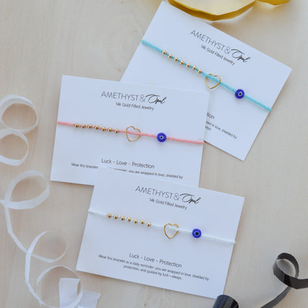 Amethyst & Opal jewelry cards with bracelets on a light background
