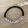 Personalized onyx beaded bracelet with custom name or word. Bold, meaningful, and perfect for stacking bracelets or gifting.