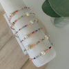 Add vibrant summer vibes to your stack with Rainbow Fun Seed Bead Bracelets featuring delicate freshwater pearls.